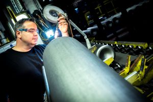 Worthington employee inspects Steel gas cylinders – TYPE I
